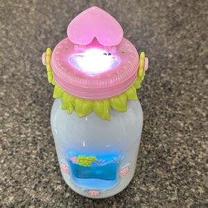 Enchanting Light-Up Jar with Pink and Green Accents